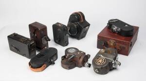 A group of 16mm movie cameras - early types. With Kodak Cine Kodak Model B, Keystone Movie Camera Model C, Cine-Ansco Model A, Vitascope Moviemaker, Stewart-Warner Hollywood, MCM Tourist, Victor 3, Victor 5, and DeVry Q.R.S model B camera/projector. (9 ca