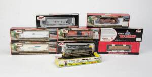 ATLAS: HO-Gauge Alco C-245 No.8034 locomotive (Erie Lackawanna) plus freight cars: 1188 AAR 70-ton 9-panel Hopper (Burlington), 997 ACF 3560 Covered Hopper (Watkins Salt), 1504-1 ACF PressureAide Center Flow (Corn Products), 1877-1 2-Bay Open Hopper (Norf