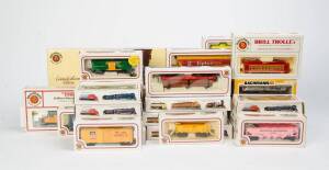 BACHMANN: A collection of HO Scale rolling stock and 3 Locomotives: "5601 CB & Q", "The Centennial DD40X" and the "Norfolk & Western Class J Bullet Nose". Mainly NIB. (30 items).