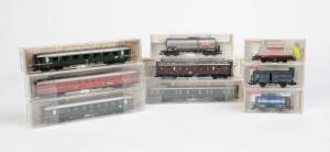 FLEISCHMANN: HO scale carriages and freight cars comprising #5436K, 5478K, 5568K, 5630K, 5631K, 5632K, 5634K, 5882K & 5890K. All NIB. (9 items).