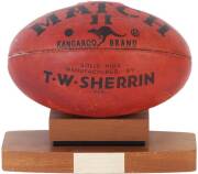 1979 PREMIERSHIP TROPHY, "T.W.Sherrin" football, mounted on wooden stand, with plaque on front engraved "Victorian Football League, Premiers 1979, Carlton def Collingwood, Donated by T.W.Sherrin". Good condition. 