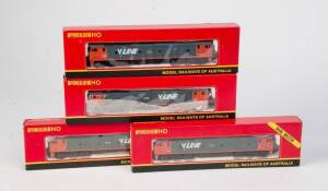 POWERLINE: An identical group of 4 locomotives; in boxes.