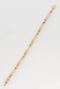 A diamond bracelet, 18ct yellow gold, weight 11.59 grams.