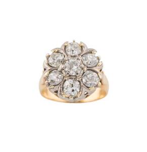 A diamond ring, the floral cluster set with seven old cut diamonds, estimated total diamond weight 2.20 carats, 18ct yellow gold, size L.