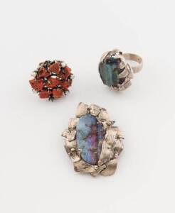 A silver and boulder opal brooch and ring of freeform design, size&nbsp;S &frac12;, and a coral and pearl dress ring, size Q.