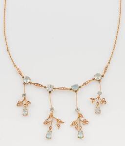 An Edwardian aquamarine and seed pearl pendant necklace, 15ct and 9ct gold, boxed.