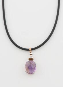 Two amethyst pendants, one set in 9ct yellow and white gold and hung on neoprene, the other a drop pendant set with cultured pearls, 9ct yellow gold.&nbsp;