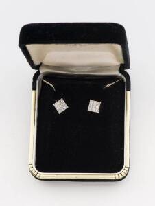 A pair of diamond earrings, the square earrings set with small princess cut diamonds of total weight 0.74 carat, stud fittings, 18ct white gold.&nbsp;