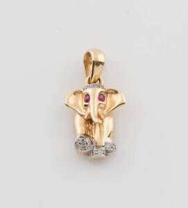 A ruby and diamond elephant pendant, length 1.7mm, 18ct yellow gold.