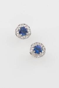 A pair of tanzanite and diamond earrings, of peirced openwork design, stud fittings, width 16.5mm.