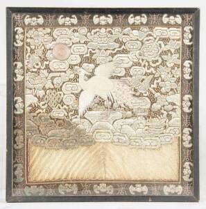 Framed Chinese textile badge, 20th Century. 26cm square