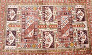 Hand woven tribal rug, 20th century. 123 x 190 cm.