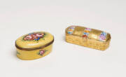 Two small porcelain and enamel boxes with floral motifs, French, late 19th century.