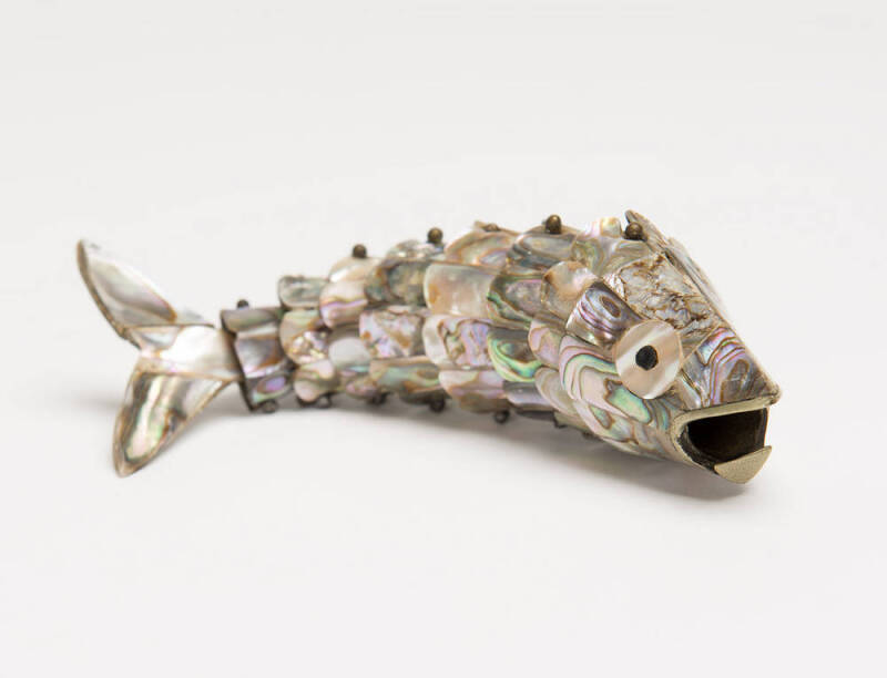 A paua shell articulated decorative fish, late 19th Century.