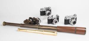 Range of cameras, equipment & binoculars including Voitlander, Zeiss Contaflex, defence department spyglass & Tasco spyglass etc. (7 items)