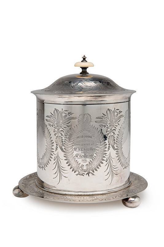 1876 MELBOURNE BOWLING CLUB TROPHY: Silver-plated Biscuit Barrell, engraved on front "Melbourne Bowling club, Presented by Mr R.Girdler, won by Mr.Geo.Kirk, 1876". [The Melbourne Bowling Club is Australia's oldest bowling club, established in 1864].