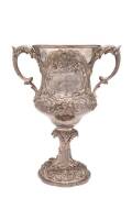 1888 COLOURED CHAMPION OF THE WORLD BOXING TROPHY, Victorian sterling silver two-handled trophy cup embossed with flowers & floral scrolls, hallmarked London 1860, with maker's mark "GE", engraved on front "PRESENTED to PETER JACKSON, COLOURED, CHAMPION B