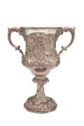 1888 COLOURED CHAMPION OF THE WORLD BOXING TROPHY, Victorian sterling silver two-handled trophy cup embossed with flowers & floral scrolls, hallmarked London 1860, with maker's mark "GE", engraved on front "PRESENTED to PETER JACKSON, COLOURED, CHAMPION B - 2