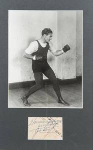 JACK DEMPSEY, display comprising signature on piece, window mounted with action photograph, framed & glazed, overall 26x40cm.