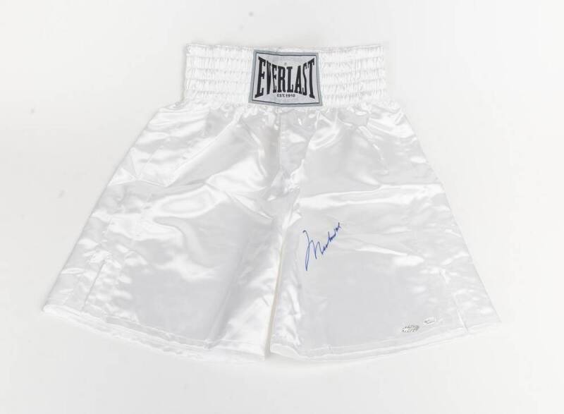 MUHAMMAD ALI, signature on pair of 'Everlast' boxing shorts. With 'Online Authentics' No. OA-8090205.