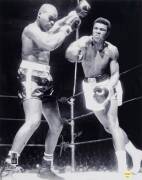 MUHAMMAD ALI, signed photograph from the Muhammad Ali vs Doug Jones fight, March 13th 1963, size 40x51cm. With 'Online Authentics' No.OA-8090291.