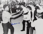 MUHAMMAD ALI & THE BEATLES, photograph of Ali clowning around with The Beatles, signed "Muhammad Ali", size 51x40cm.