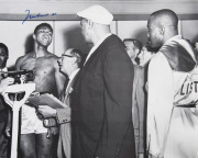 MUHAMMAD ALI, signed b/w photograph of Ali at weigh-in with Sonny Liston, size 51x41cm. - 2