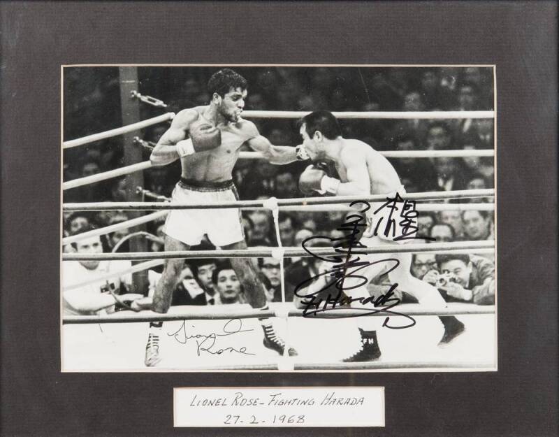 LIONEL ROSE v FIGHTING HARADA, both signatures on action photograph, window mounted, framed & glazed, overall 34x27cm.