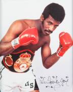 SIGNED PHOTOGRAPHS, noted George Foreman, Marvellous Marvin Hagler, Michael Spinks & Leon Spinks. All framed. - 2