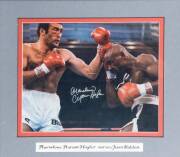 SIGNED PHOTOGRAPHS, noted George Foreman, Marvellous Marvin Hagler, Michael Spinks & Leon Spinks. All framed. - 3