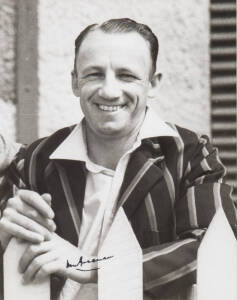 DON BRADMAN, nice signature on photograph of the Don wearing his South Australian blazer, framed (no glass), overall 35x43cm.