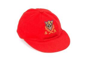 TERY JENNER'S SOUTH AUSTRALIA CAP, red wool with embroidered SA logo on front. Good match-used condition.