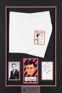 JOHN COLEMAN (Essendon), display comprising pair of John Coleman Footy Shorts (with scarce c1950 PLB "John Coleman Footy Shorts Label" sought after by football card collectors), window mounted with signed photograph & Argus "1953 Football Portraits" card,