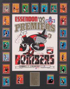 ESSENDON: "Essendon 93 Premiers" display with felt Weg poster signed by Kevin Sheedy & Mark Thompson, window mounted with 1993 Classic Collectables "AFL Premiers - Essendon" metallic football cards [21], framed & glazed, overall 75x94cm. With CoA.