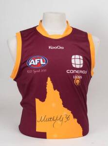 BRISBANE LIONS, signed No.36 jumper of Matt Maguire match worn in 2011 Round 1 NAB cup match. With CoA.