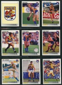 1993-94 football cards in album, noted 1993 Select [192]; 1994 Select base set [200] & "Gold Series" [15/20]; 1994 Select "Cazaly Classics" [100], "Gold Cards" [9] & "Tony Modra Wild Card"; 1994 Sassy Concepts "Superstars" [6] & Teams (8). G/VG.