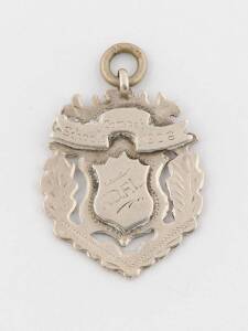 FOOTBALL MEDAL, 1906 sterling silver fob/medal, engraved on front "N.D.F.L. Schools Compet. 1906".