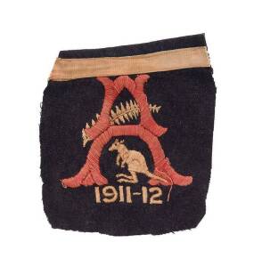 PETER BURGE'S BLAZER POCKET FROM 1911-12 KANGAROOS TOUR, embroidered with "A" over silver fern & kangaroo. [Peter Harold Boyne Burge (1884-1956) was an Australian rugby footballer and coach. He represented his country in both rugby league and rugby union.