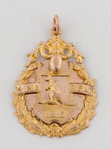 FOOTBALL MEDAL, 1915 "NB RFL" 9ct gold fob/medal, with Kangaroo & football on front, engraved on reverse "Winners, 2nd Grade Competition, Western Suburbs, G. Fellows".