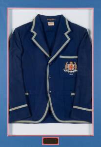 NOEL HOLLINGDALE"S NSWRL BLAZER, blue wool with pocket embroidered NSW Coat-of-Arms with "N.S.W.R.F.L." & "1940", window mounted, framed & glazed, overall 76x107cm. [Noel Hollingdale played 53 games for Easts 1938-42, and was hooker in easts 1940 Grand Fi