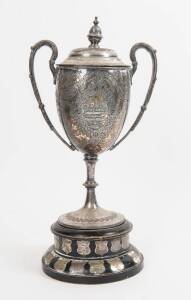 JUNIORS TROPHY: Silver-plated Trophy Cup, 52cm tall, engraved "Presented to the V.A.B.F.A. For Junior Competition, By H.Dockerty & W.Shapcott, 1911", with shields on base for winners 1911-67. Winners include Wallabies, Preston, Welsh United, Brunswick, No