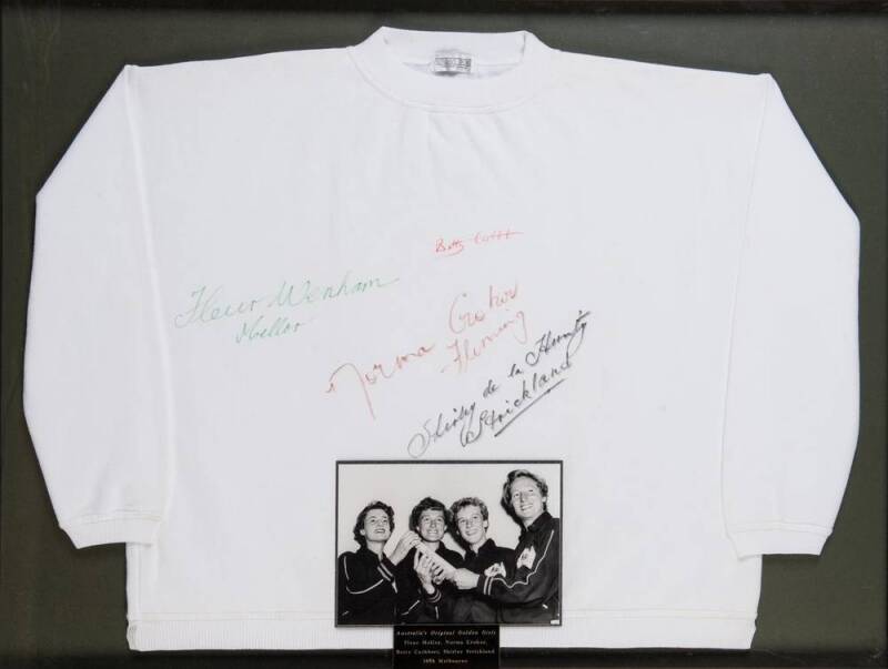 "Australia's Original Golden Girls", display with white windcheater signed by Betty Cuthbett, Shirley Strickland, Fleur Mellor & Norma Croker, window mounted with b/w photograph of the four girls at the 1956 Melbourne Olympics, framed & glazed, overall 10