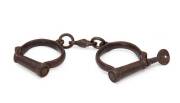 Pair of Government issue manacles with broad arrow stamp dated 1917.