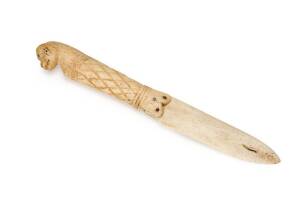 A whalebone paper knife, 19th Century. 19cm