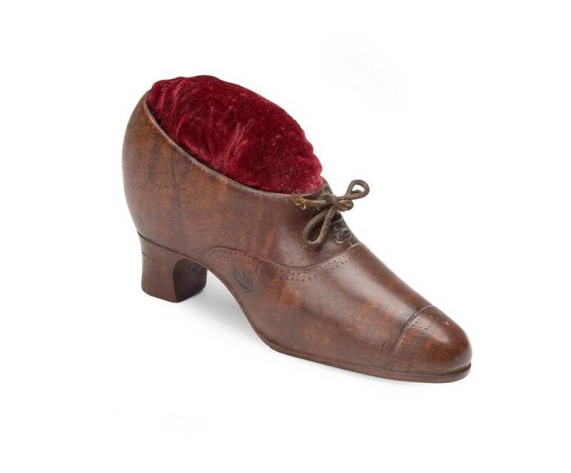 Hatpin cushion in the form of a ladies shoe, carved redgum & velvet, 19th century. Length 15cm