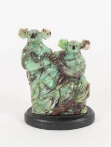 CHRYSO KOALAS: Pair of koalas carved from Crysoprase, Kalgoorlie, WA, 14cm tall.