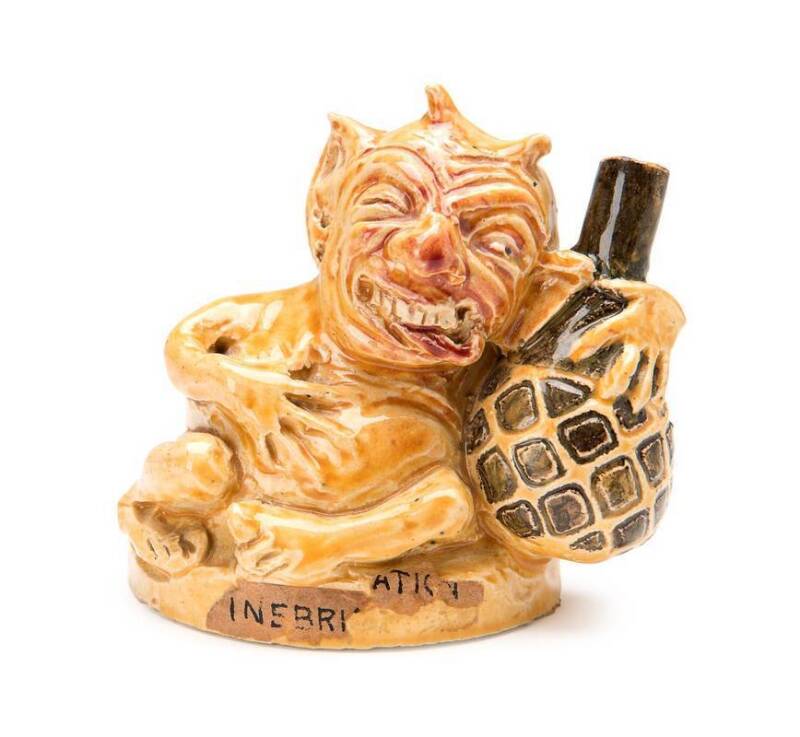 Marguerite Mahood pottery grotesque statue with original paper label title "INEBRIATION". 9cm