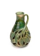 Marguerite Mahood reticulated pottery gum leaf vase with handle. 12cm