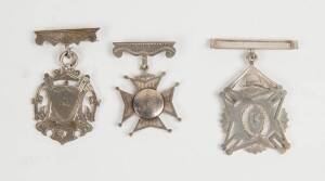 FIRE BRIGADE MEDALS, c1890 sterling silver fobs/medals (3) awarded to E.Fellows, with initials "EF" on front; engraved on reverse "Lambton Fire Brigade, Long Service Medal E.Fellows 1892"; "L.F.B.D. 1893 2 Men Engine, 1st Lambton"; "N'Castle Fire Brigade,