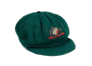 DON BRADMAN'S 1934 AUSTRALIAN "BAGGY GREEN" TEST CAP, green wool, wire-embroidered Australian Coat-of-Arms & "1934" on front, Farmers label inside endorsed "D.G.Bradman". Few small moth holes, otherwise good match-worn condition.Provenance: Bradman origin